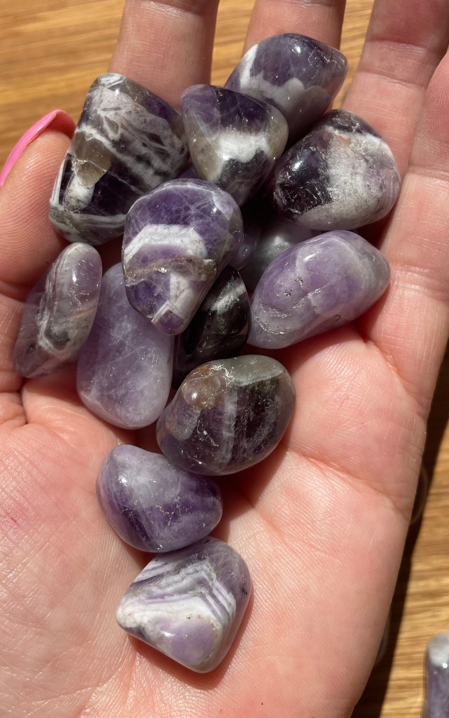 Banded amethyst tumble stone