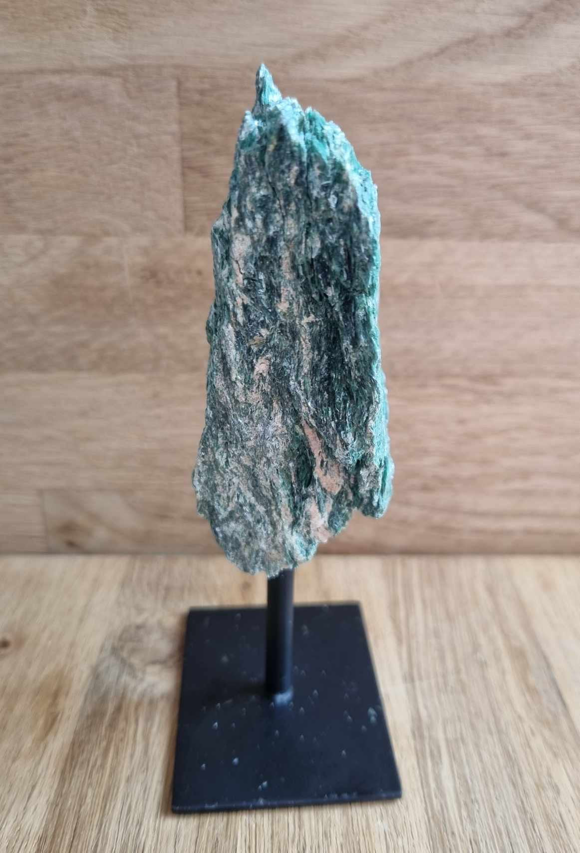 Raw fuchsite on stand