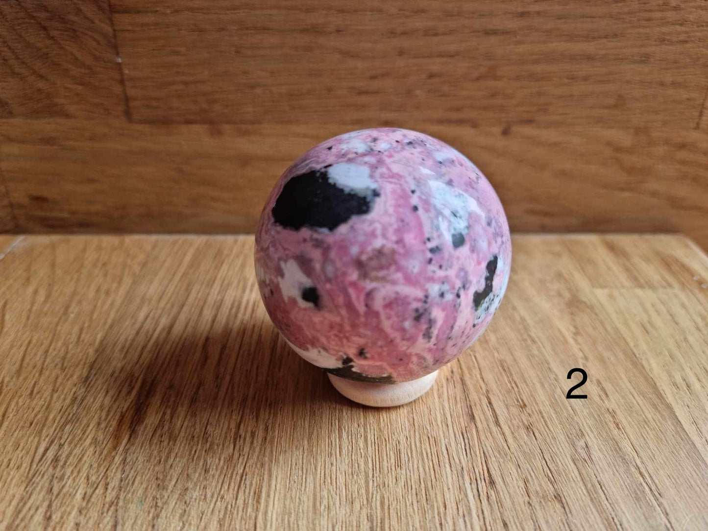 Peruvian rhodonite sphere