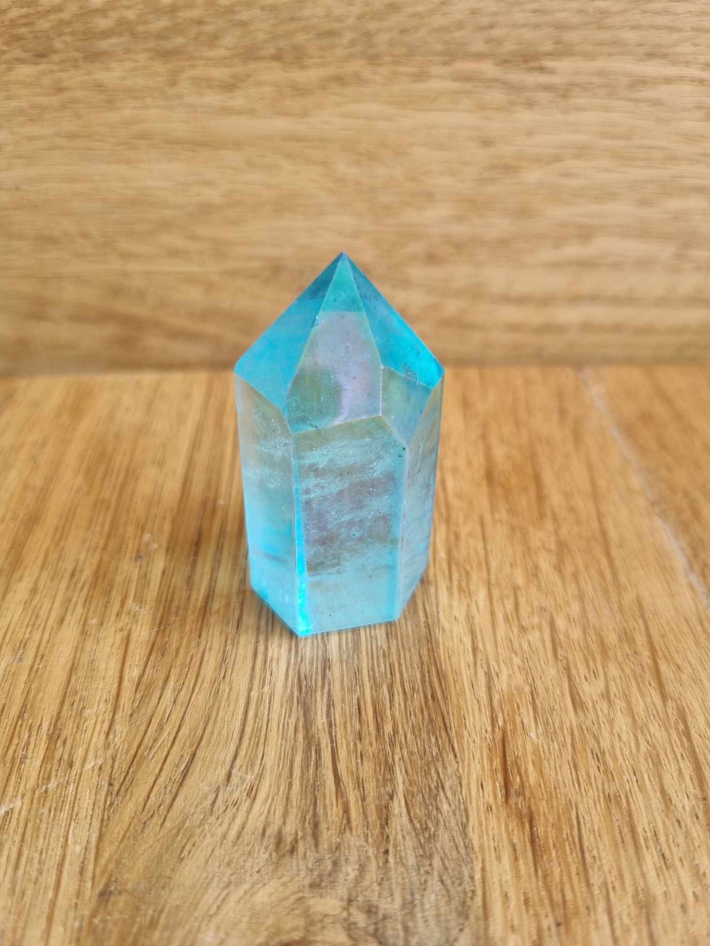 Blue aura quartz point