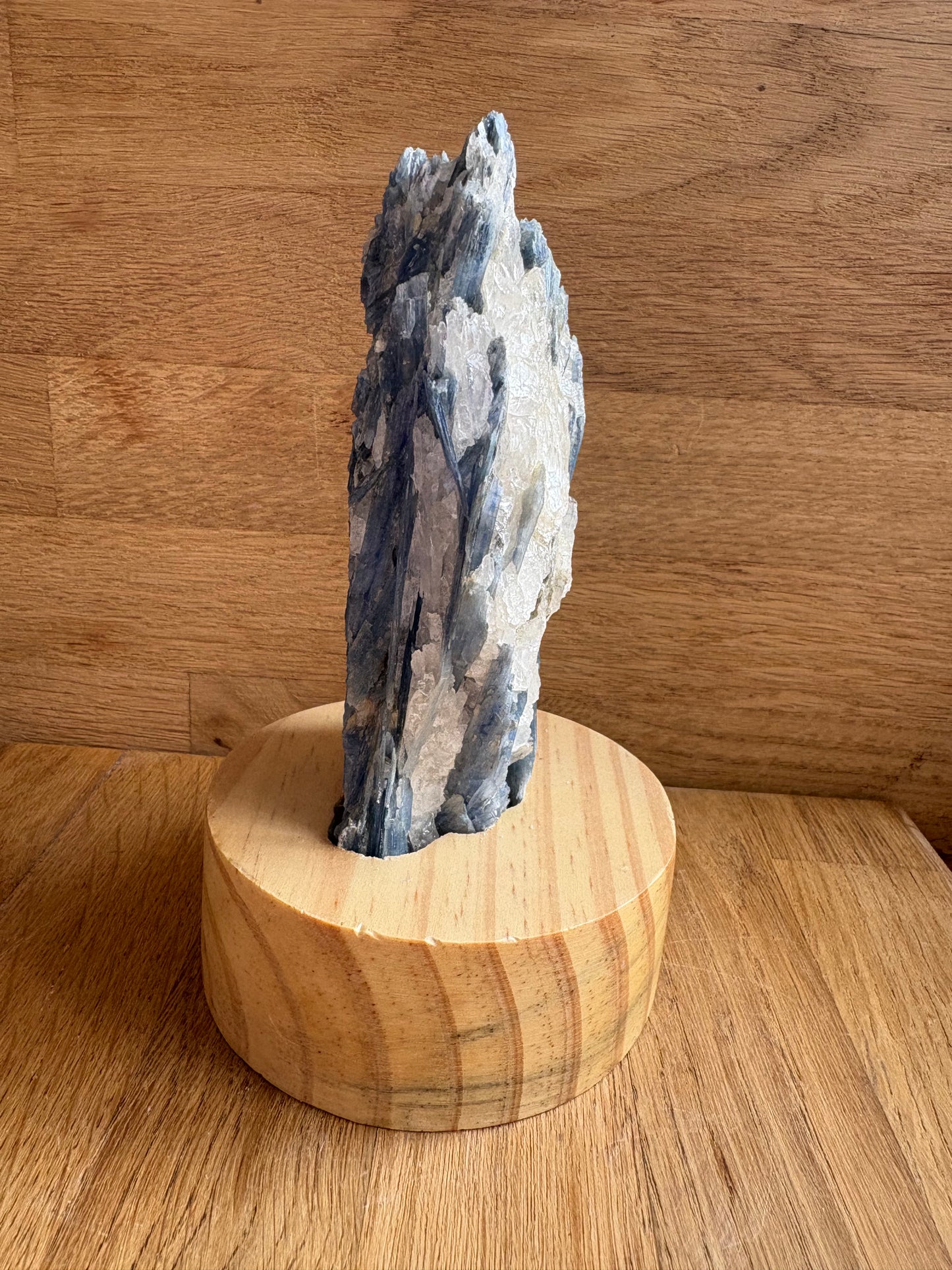 Kyanite and quartz freeform on wooden stand