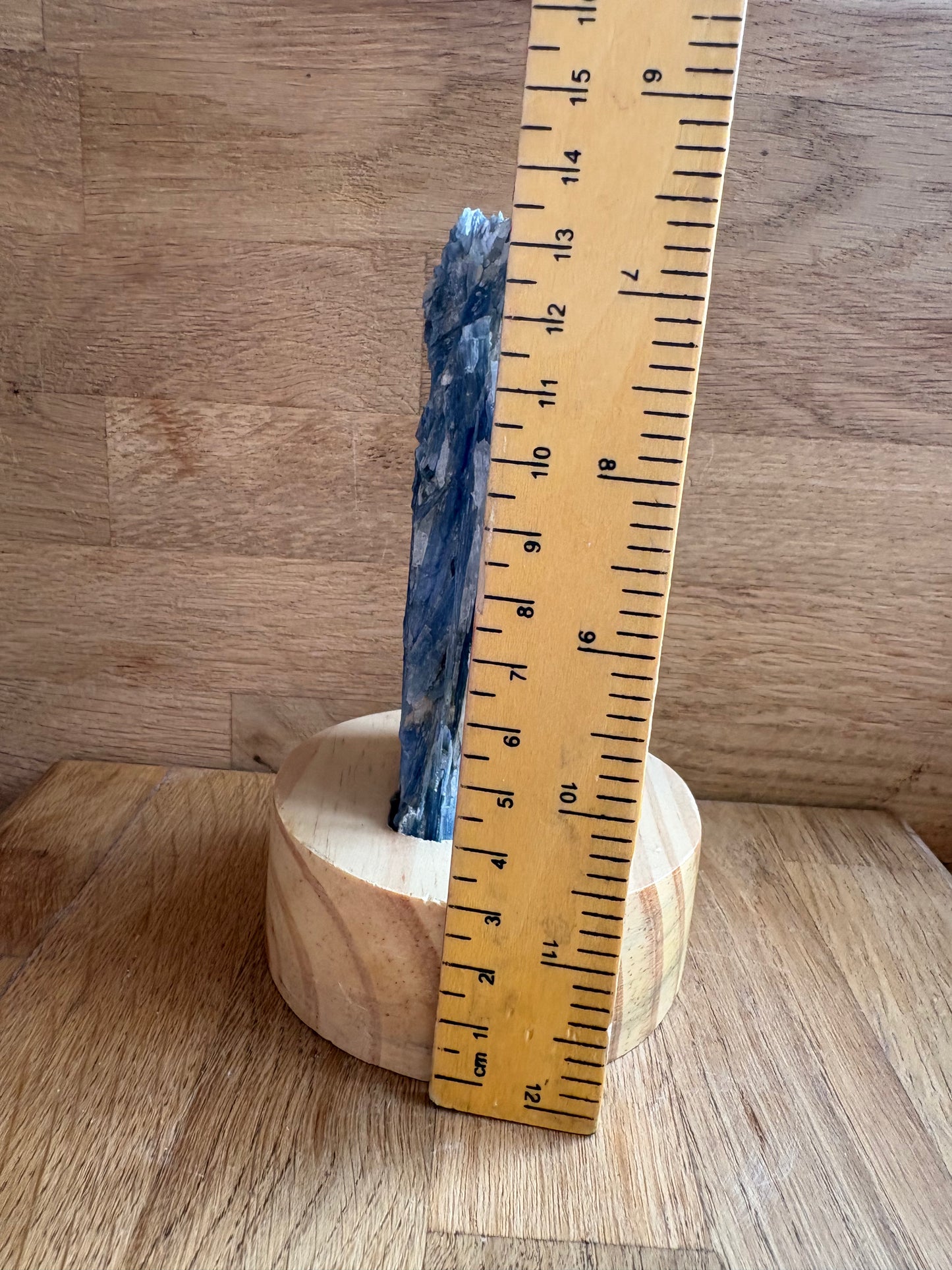 Kyanite and quartz freeform on wooden stand