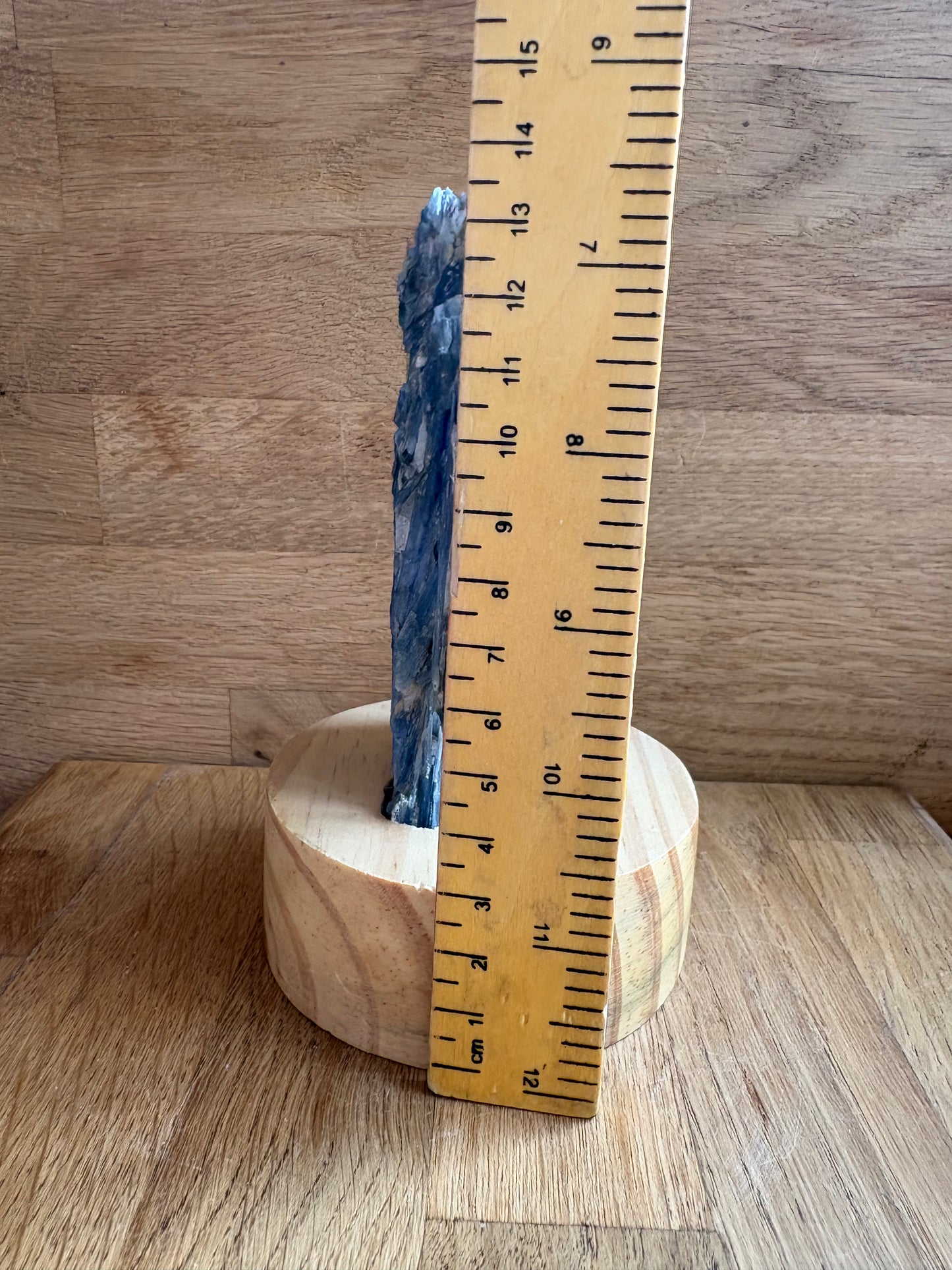 Kyanite and quartz freeform on wooden stand