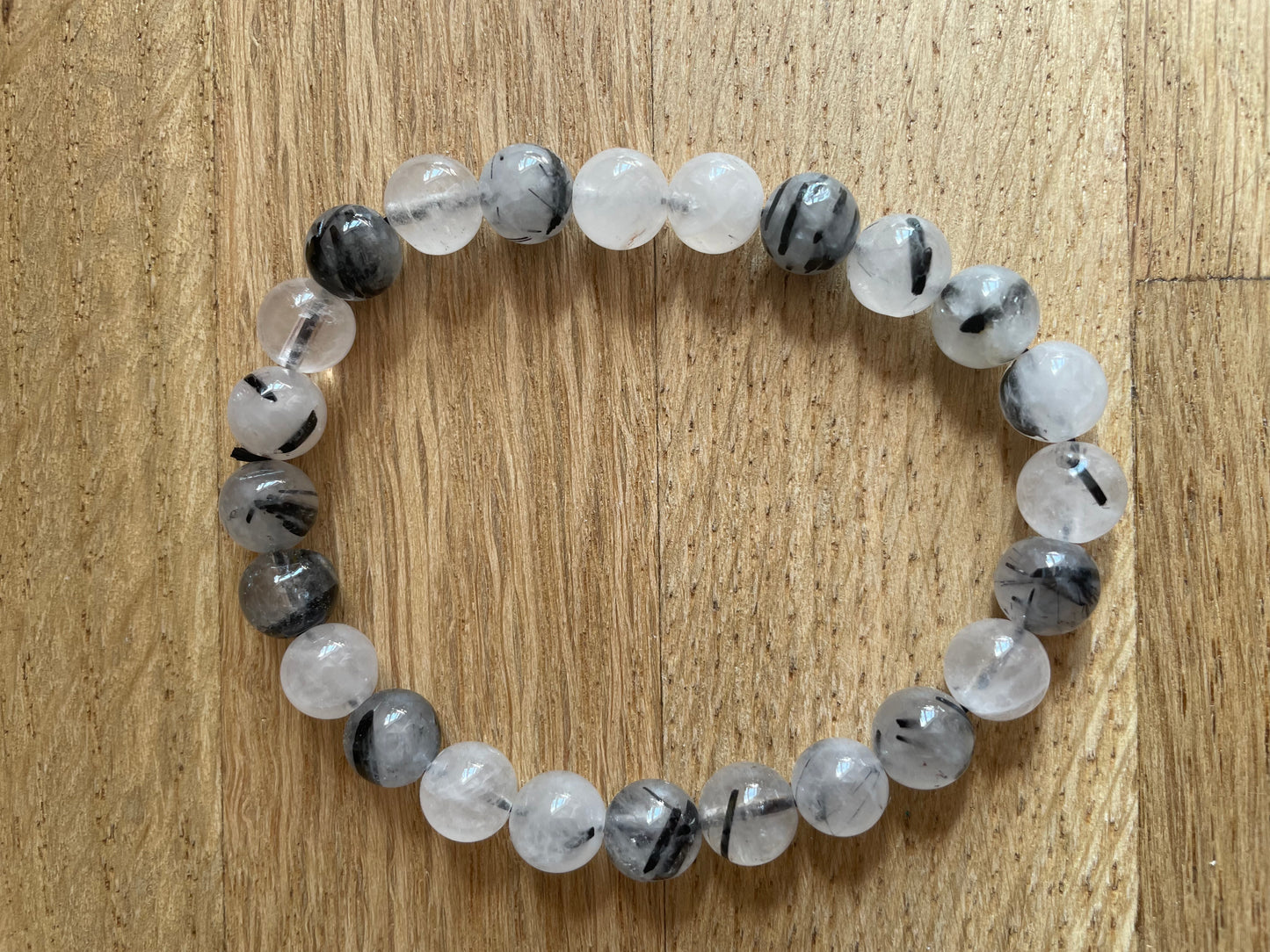 Tourmaline in quartz 8mm bead bracelet