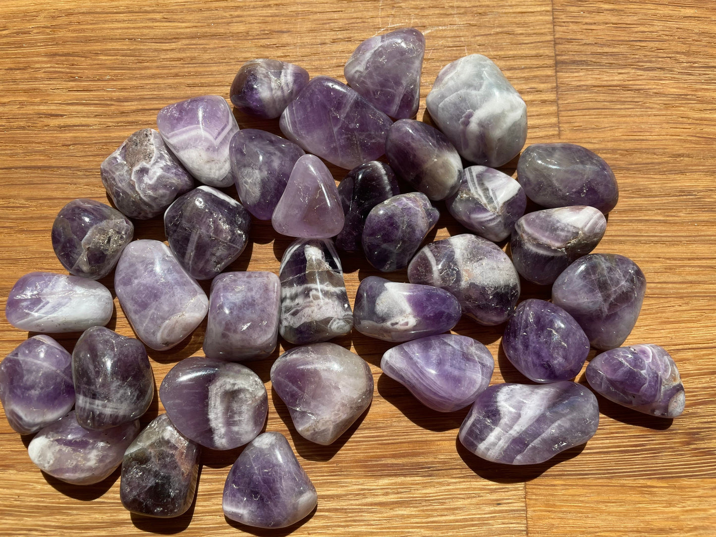 Banded amethyst tumble stone