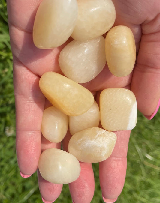 Orange calcite tumble stone