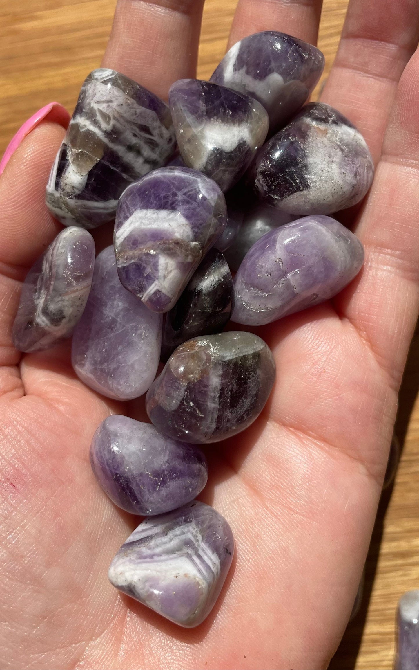 Banded amethyst tumble stone