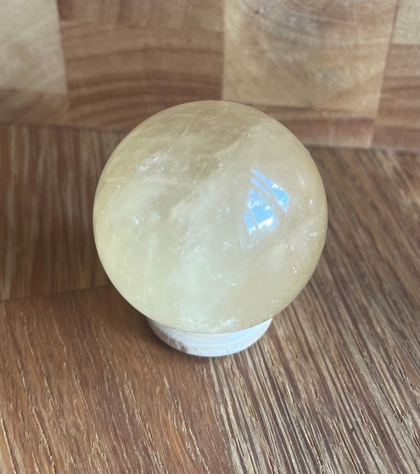 Orange calcite sphere, 3.2cm