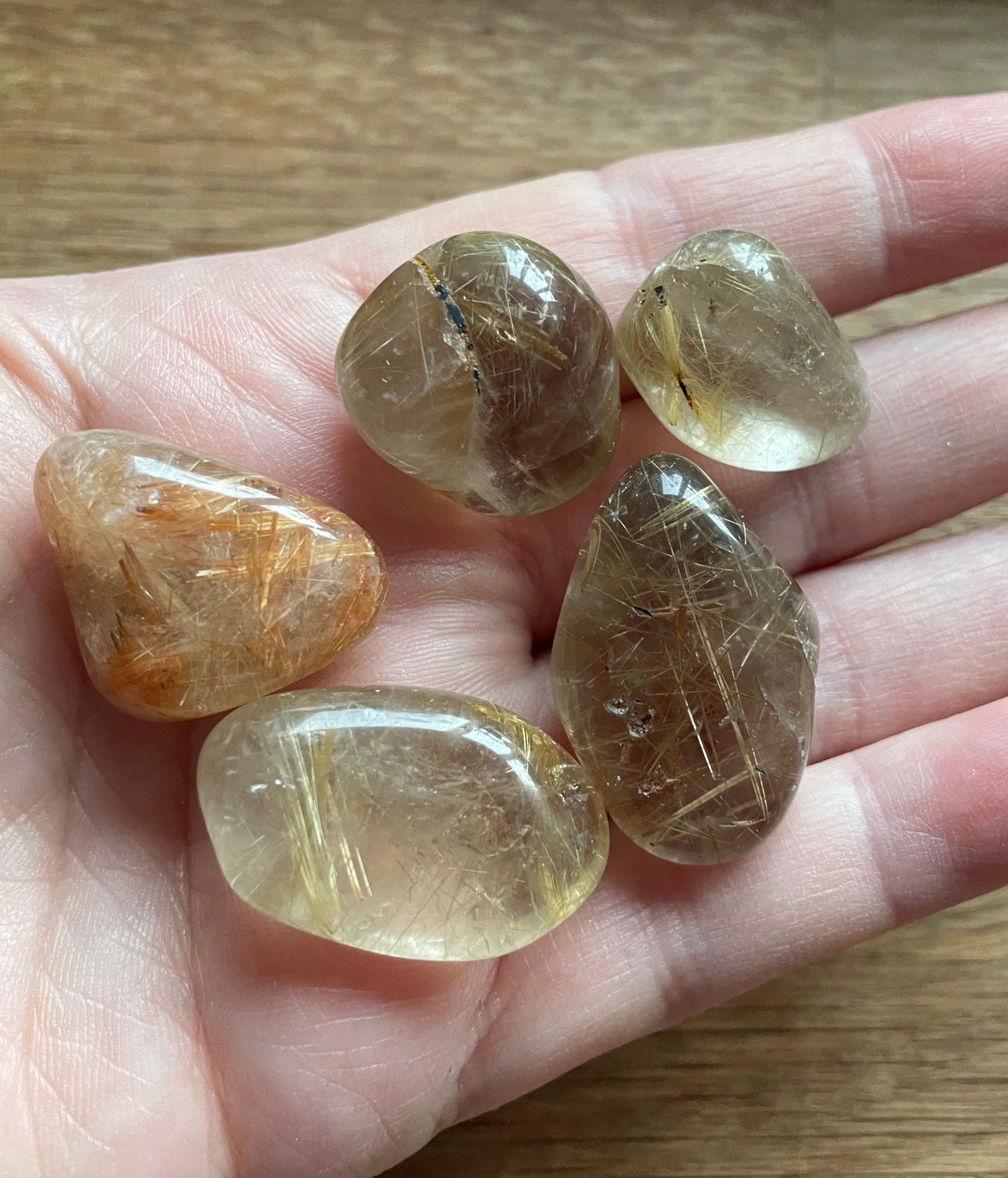 Rutilated quartz tumble stone